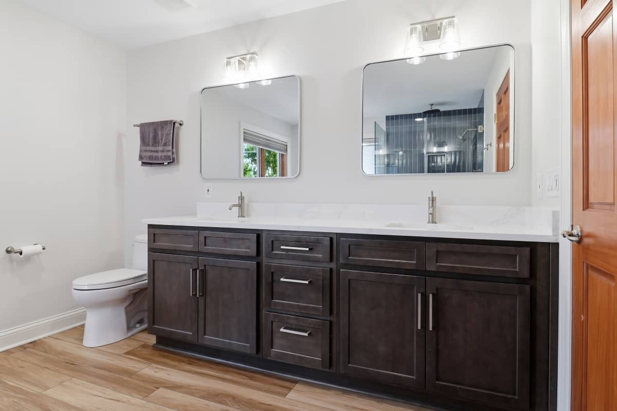 Hartland bathroom remodel with wooden cabinets