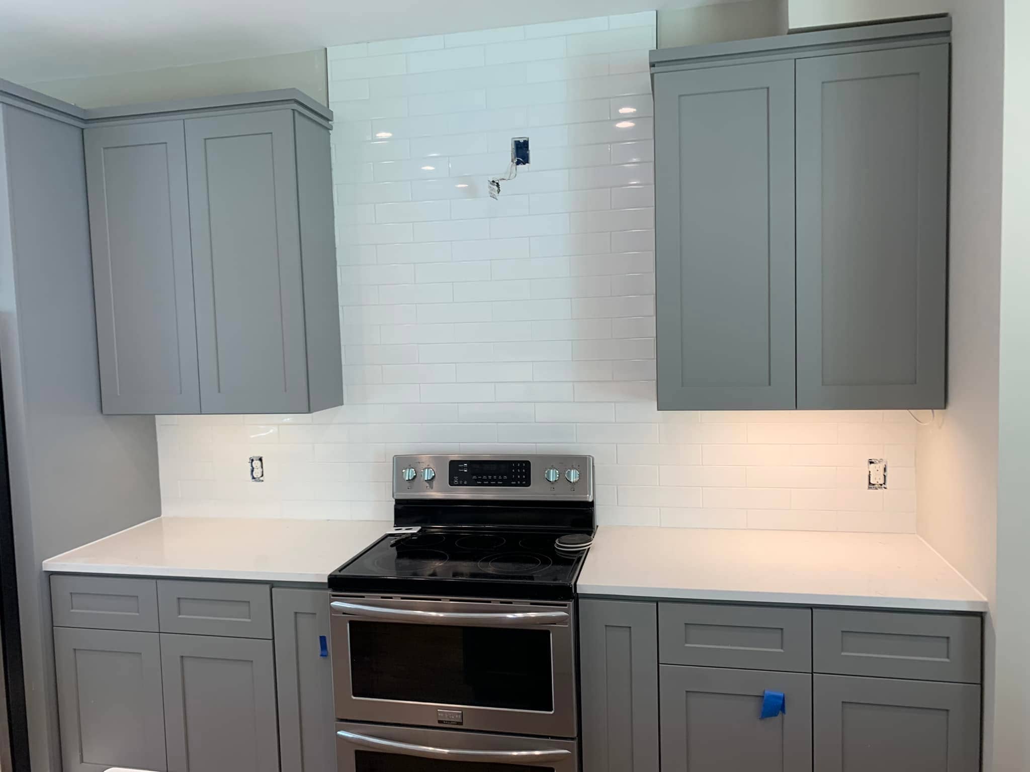 Gray-blue cabinets installation
