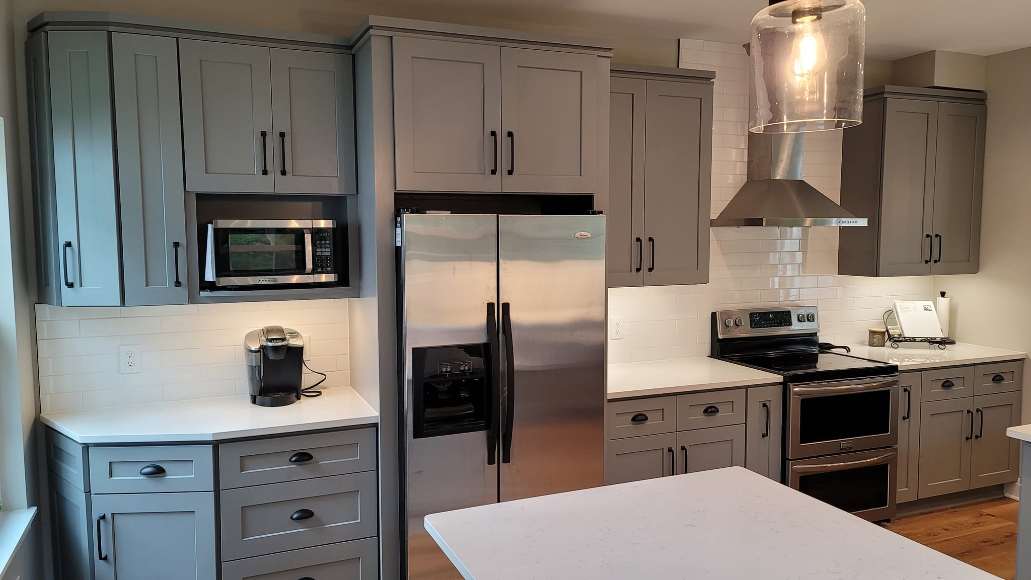 Different angle of gray cabinets installation