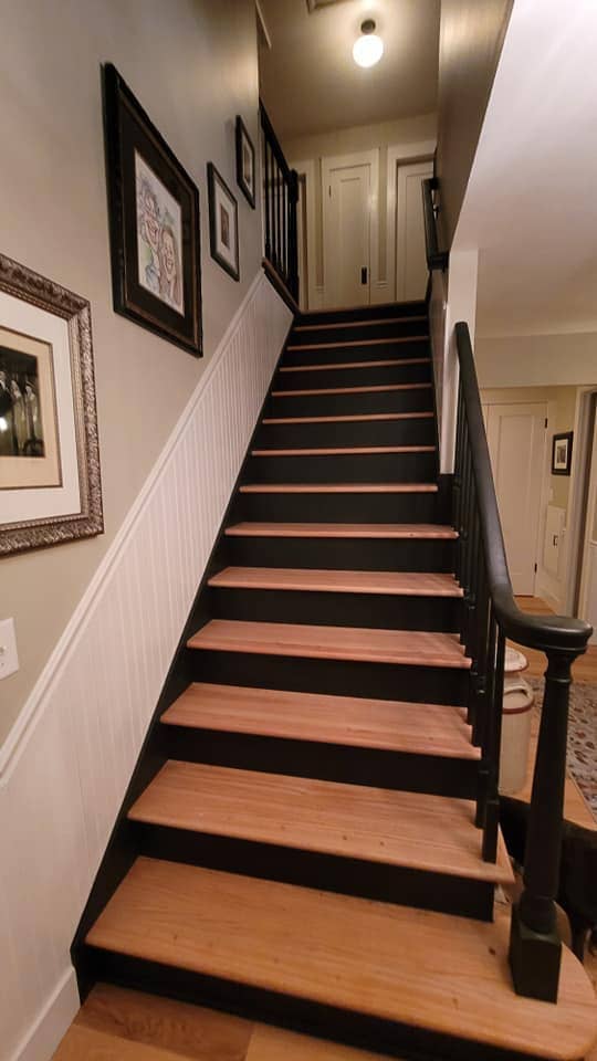 Wooden stairs installed during a full home remodel